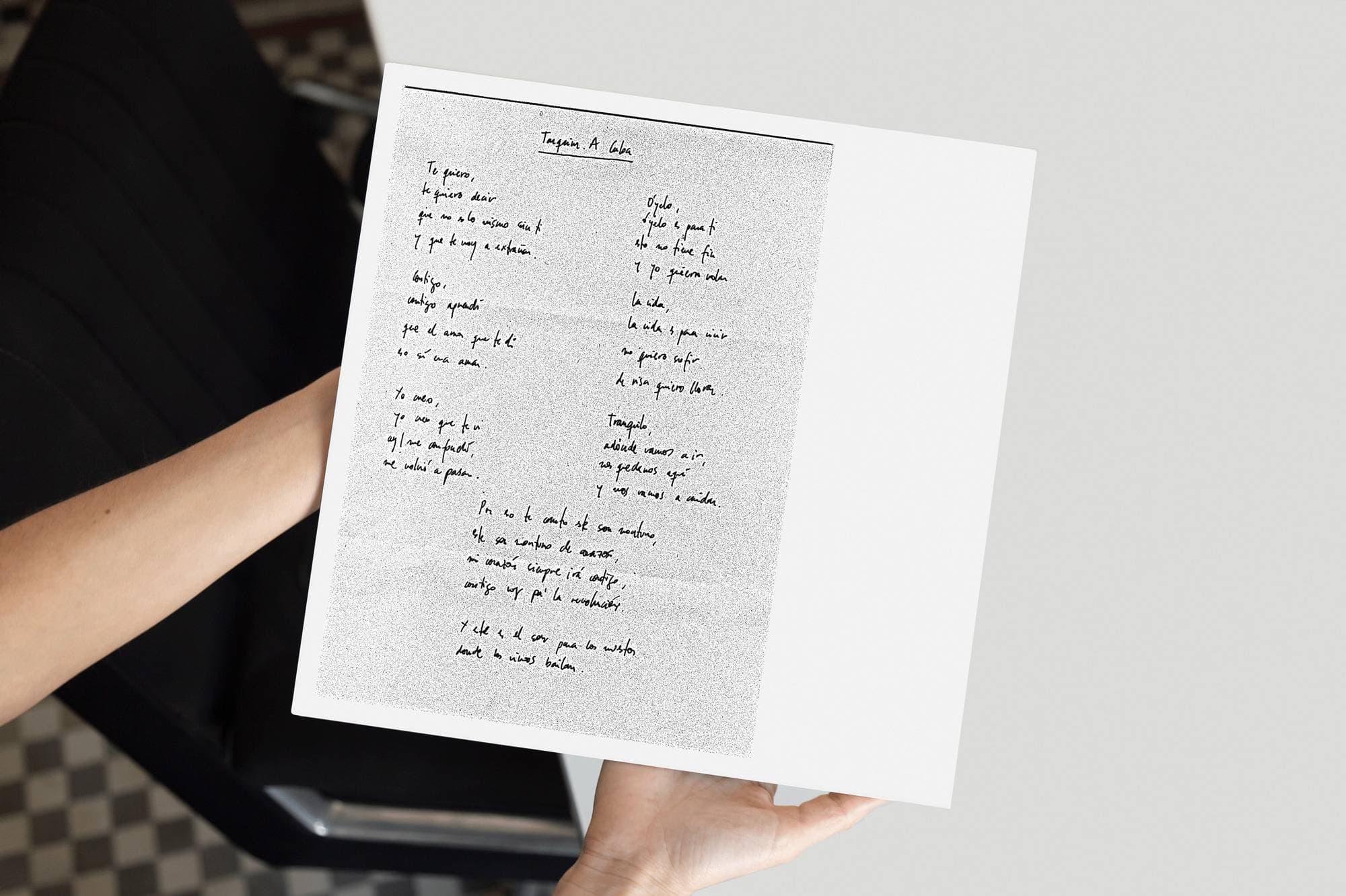 hand holding an album